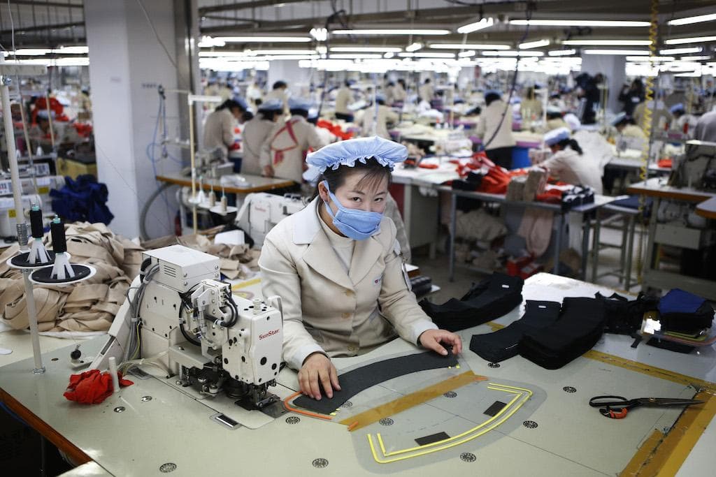 A North Korean at work in the factory of a South Korean company in Kaesong industrial zone inside North Korea, Dec. 19, 2013.
