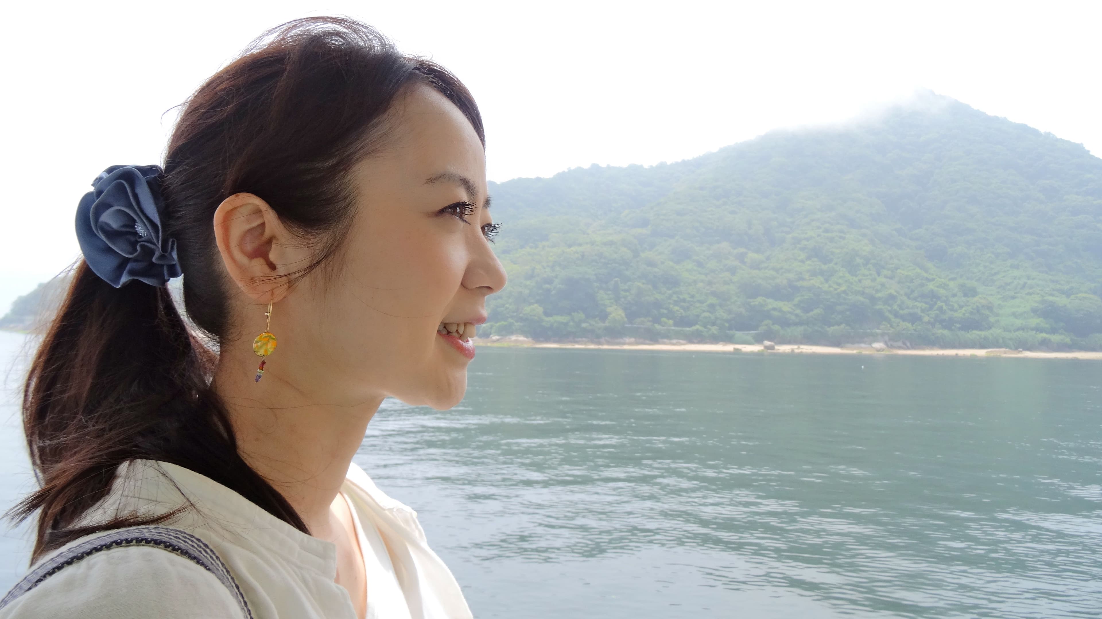 Aya Kano on board a ferry heading for the island of Ninoshima.