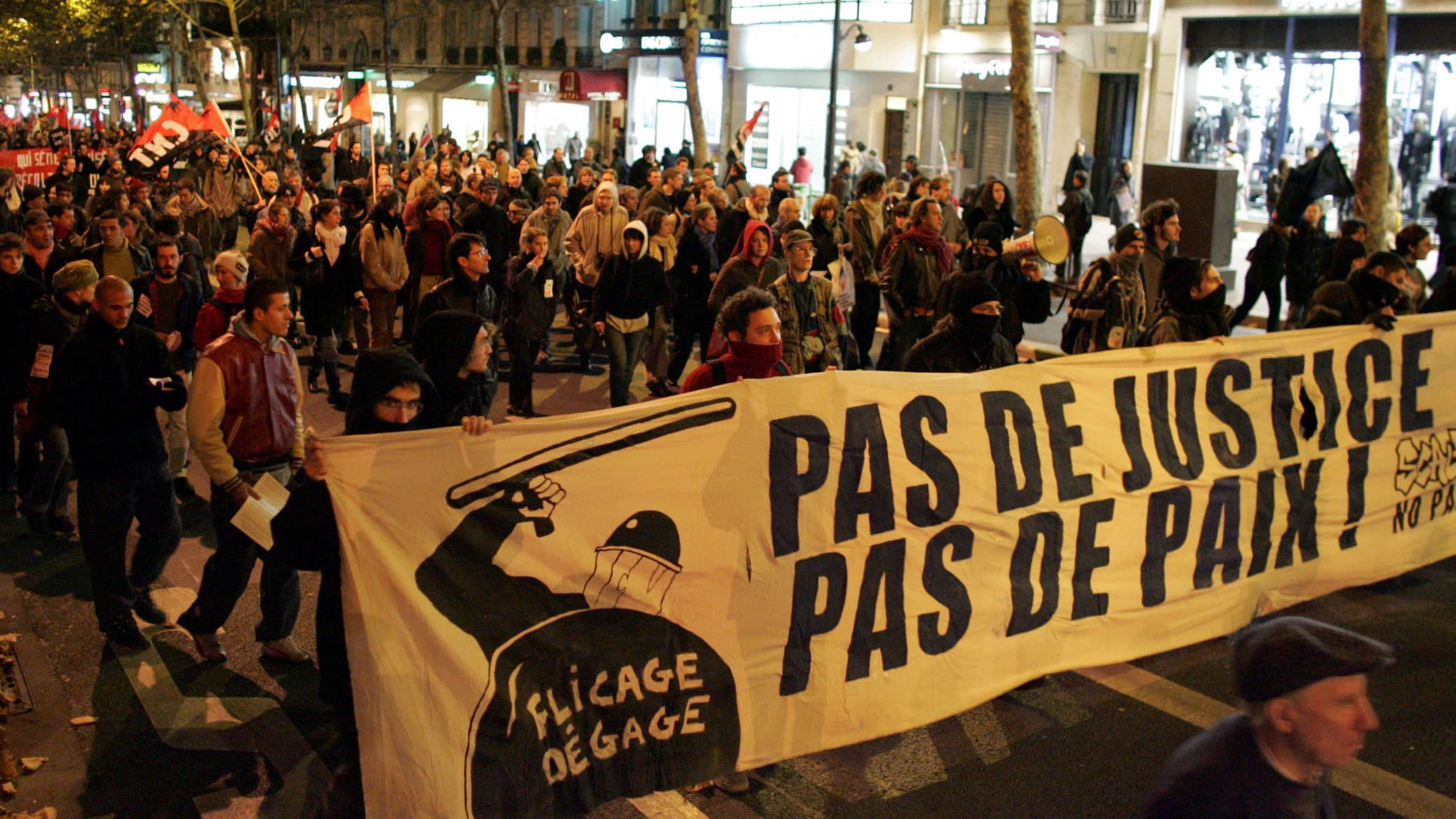 French youth take part in a protest against the government's handling of recent urban unrest in France, at Place Saint Michel in Paris, November 16, 2005.