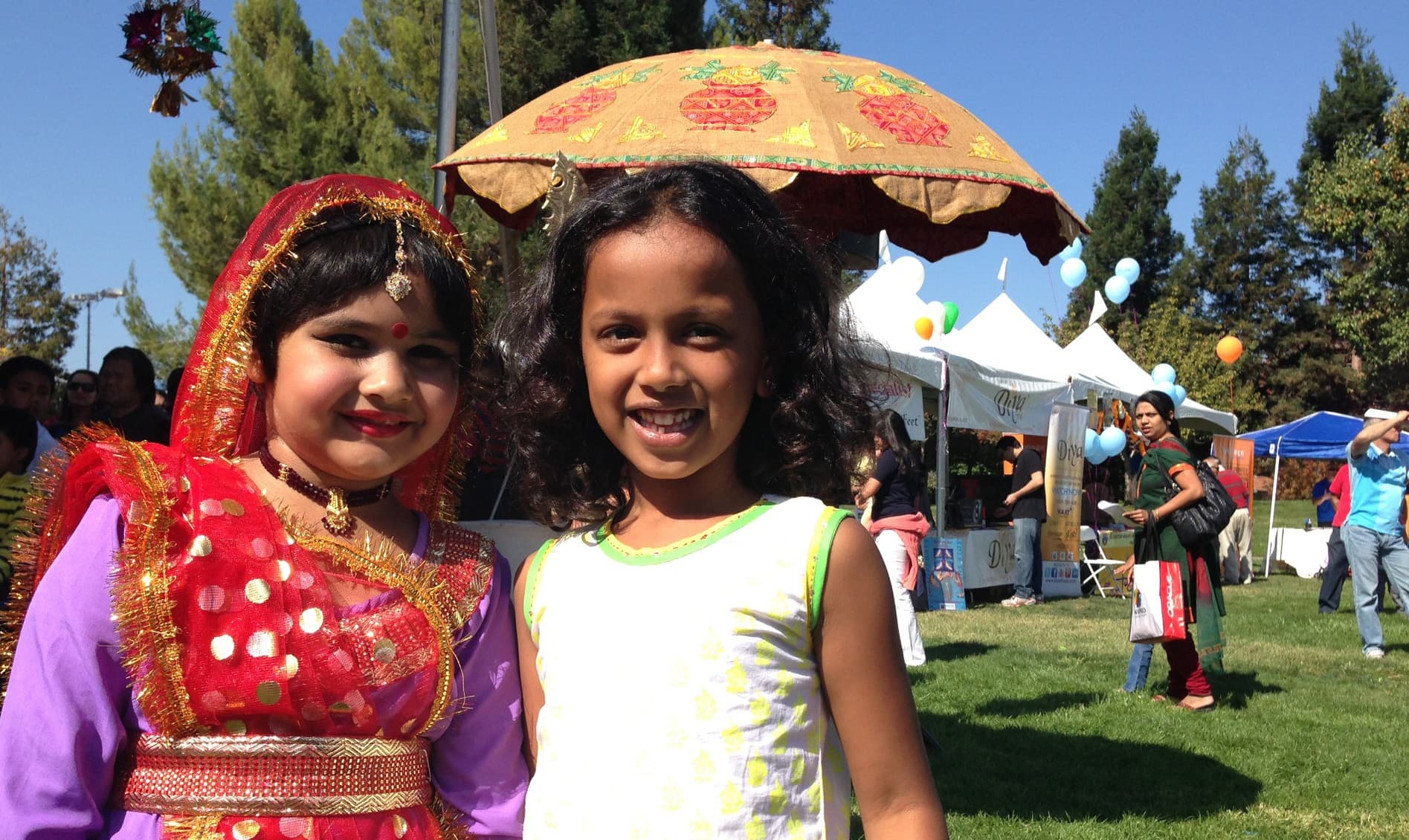 Dancers relax after performing during a Diwali Festival in Silicon Valley