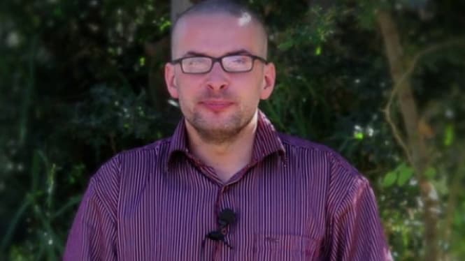 A screenshot from a video released by al Qaeda on December 4, 2014, showing hostage, Luke Somers.