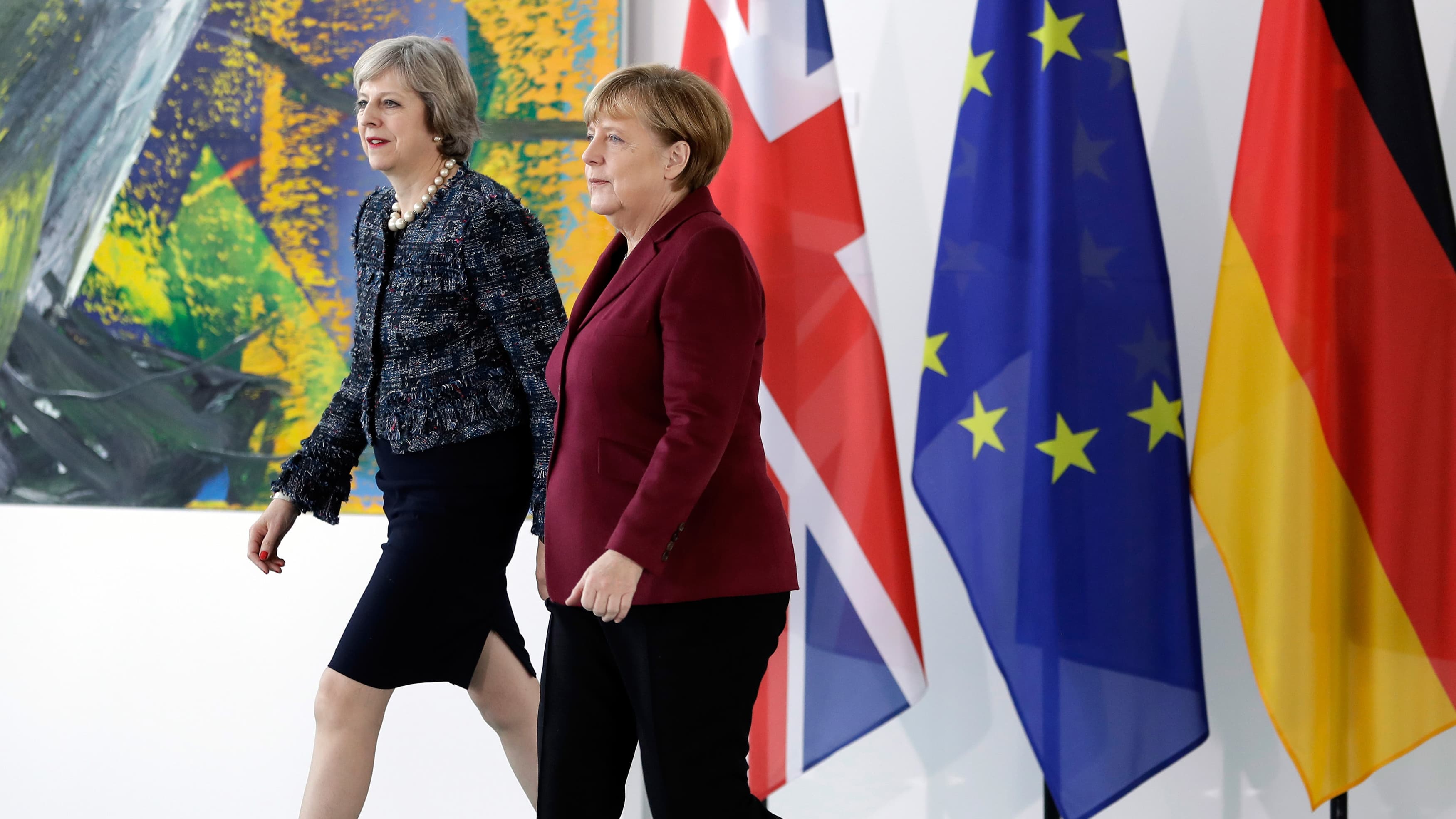 German Chancellor Angela Merkel and Britain's Prime Minister Theresa May arrive for a statement prior to a meeting at the chancellery in Berlin, Germany, November 18, 2016.