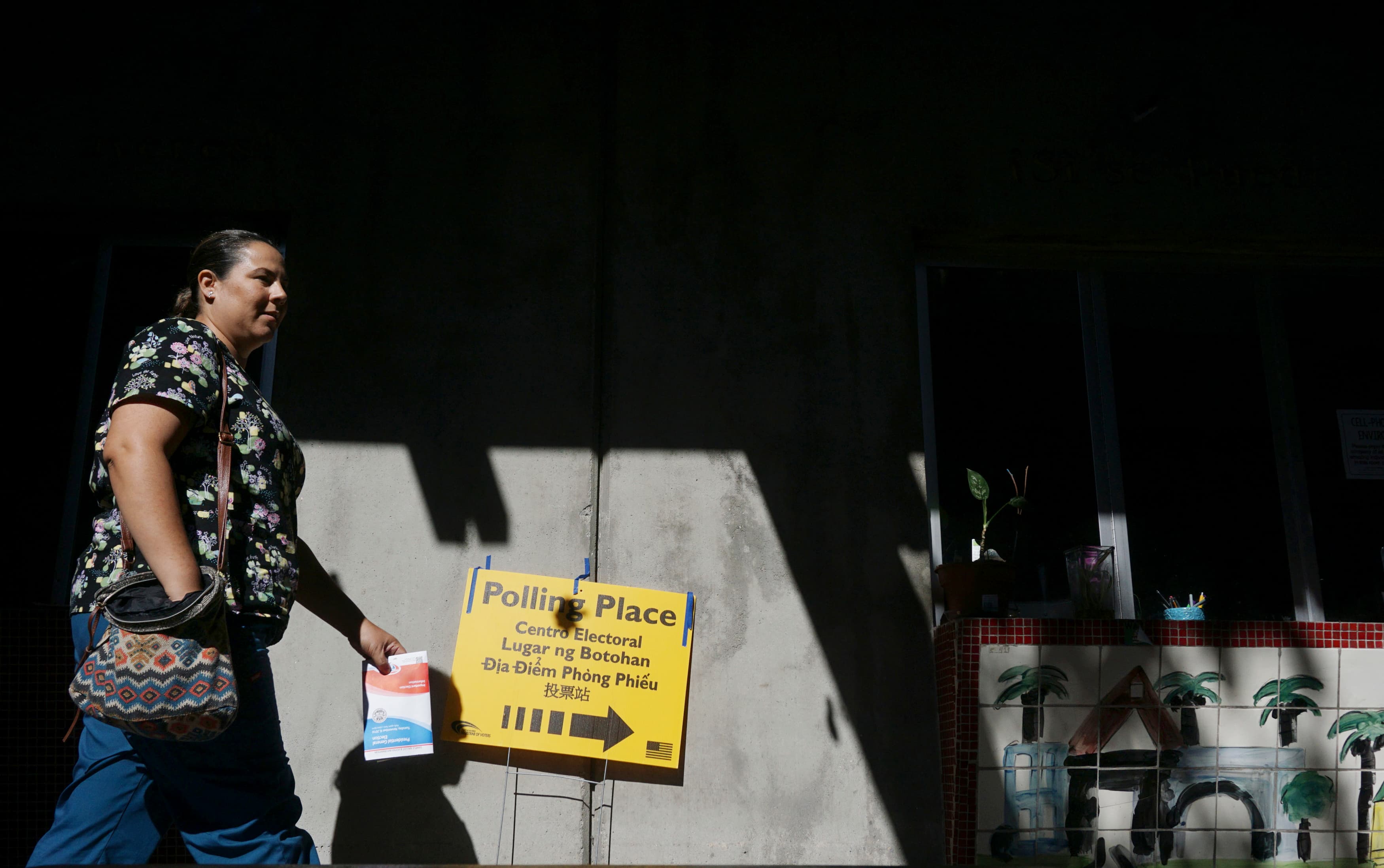 A voters arrives at a polling station