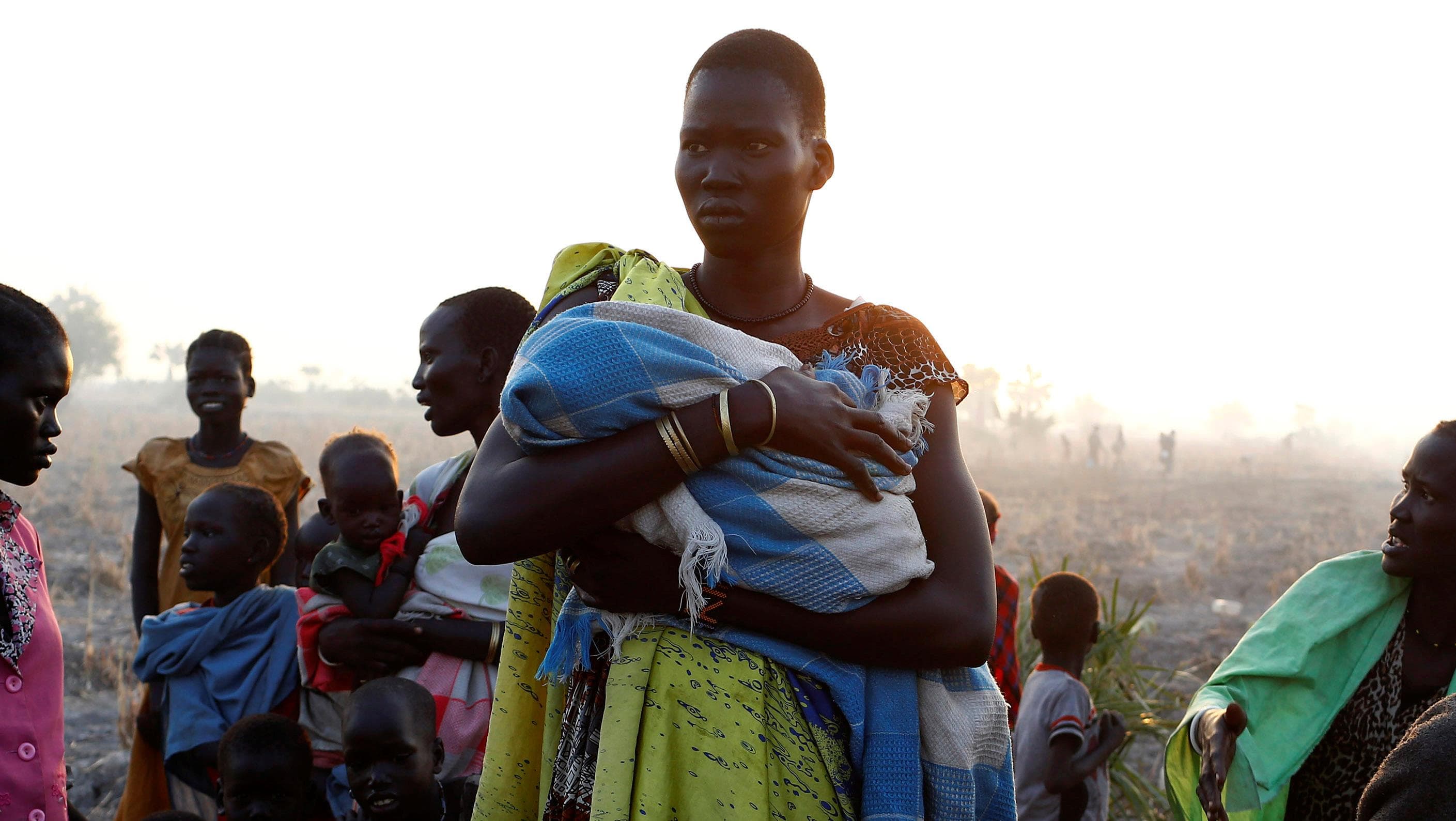 A woman waits to be registered prior to a food distribution by the United Nations World Food Programme (WFP) in Thonyor, Leer state, South Sudan.