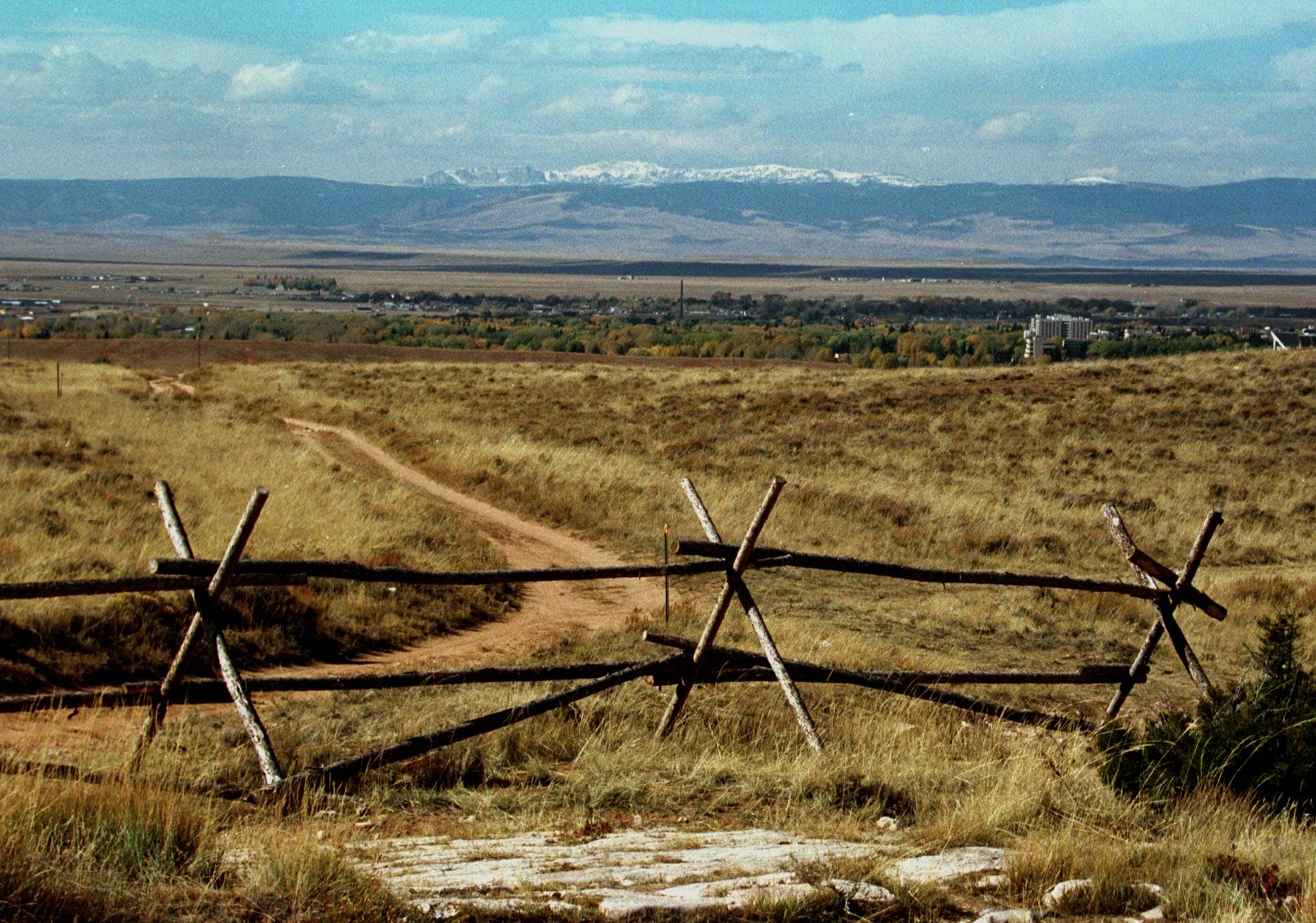 A two-tracked dirt and stone road