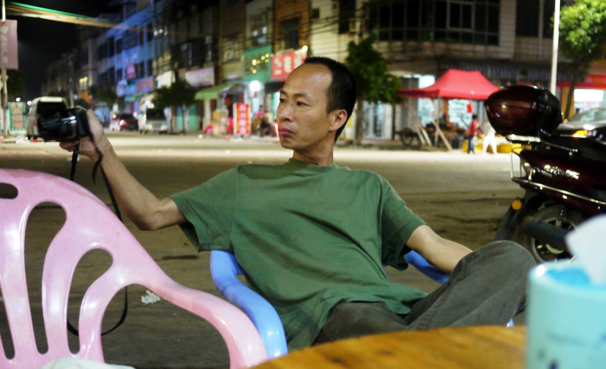 Filmmaker Zhu Rikun in his home village, Huang Niu Tian, Guangdong province in January, 2014.