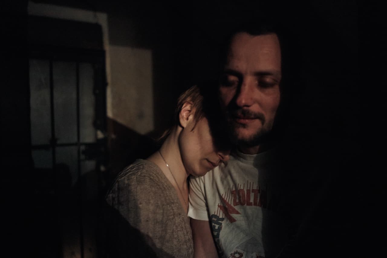 Sveta is reunited with her husband Aleksei after he spent months as POW of separatist group. He hid his HIV status from his captors while Sveta managed to sneak his meds to him. Kiev 2014.