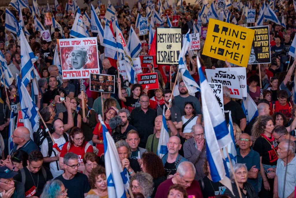 People protest against Israeli Prime Minister Benjamin Netanyahu's government and call for the release of hostages held in the Gaza Strip by the Hamas militant group in Tel Aviv, Israel, Saturday, May 4, 2024.