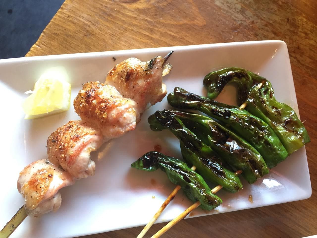 Chicken thigh “oyster” and shishito peppers