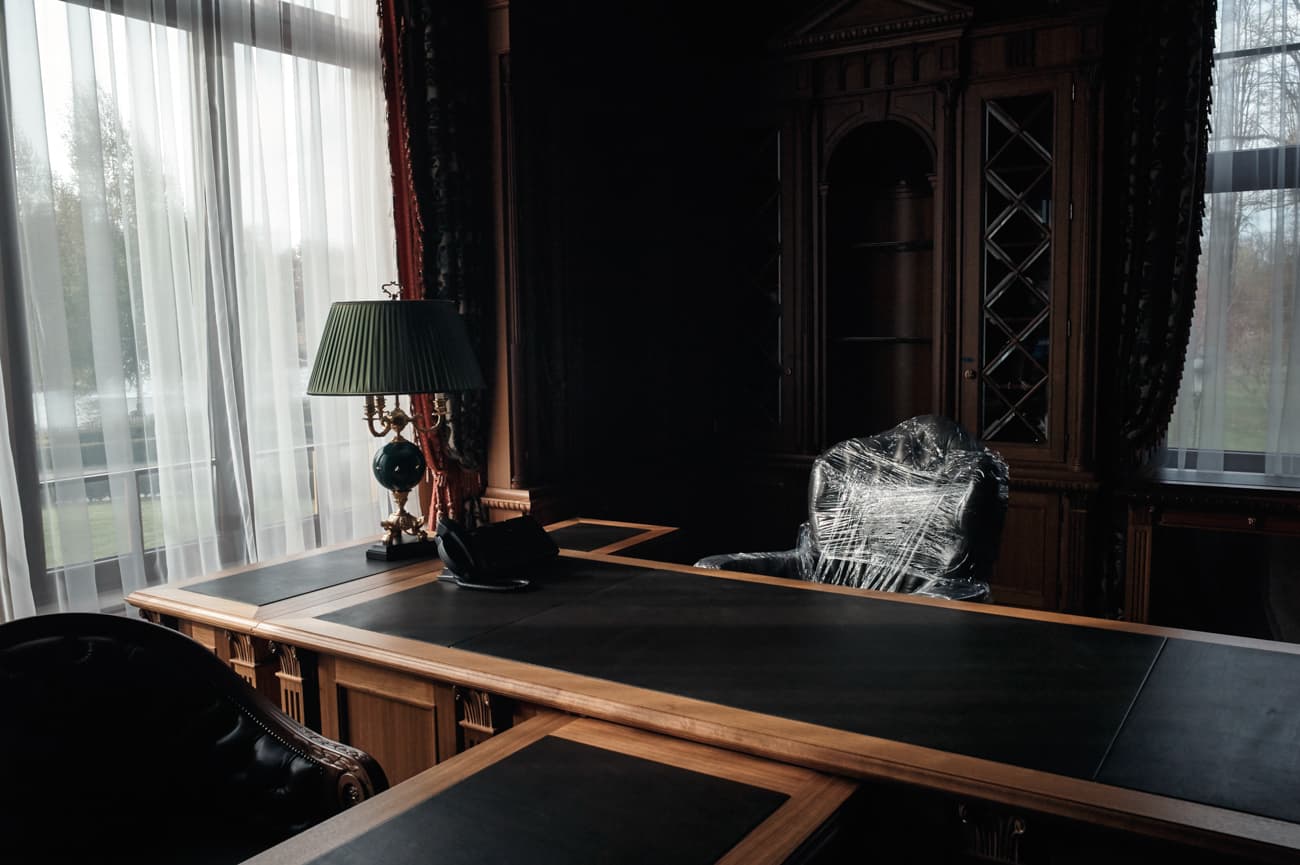 A shrink wrapped leather chair in Viktor Yanukovych's former office at Mezhyhirya.