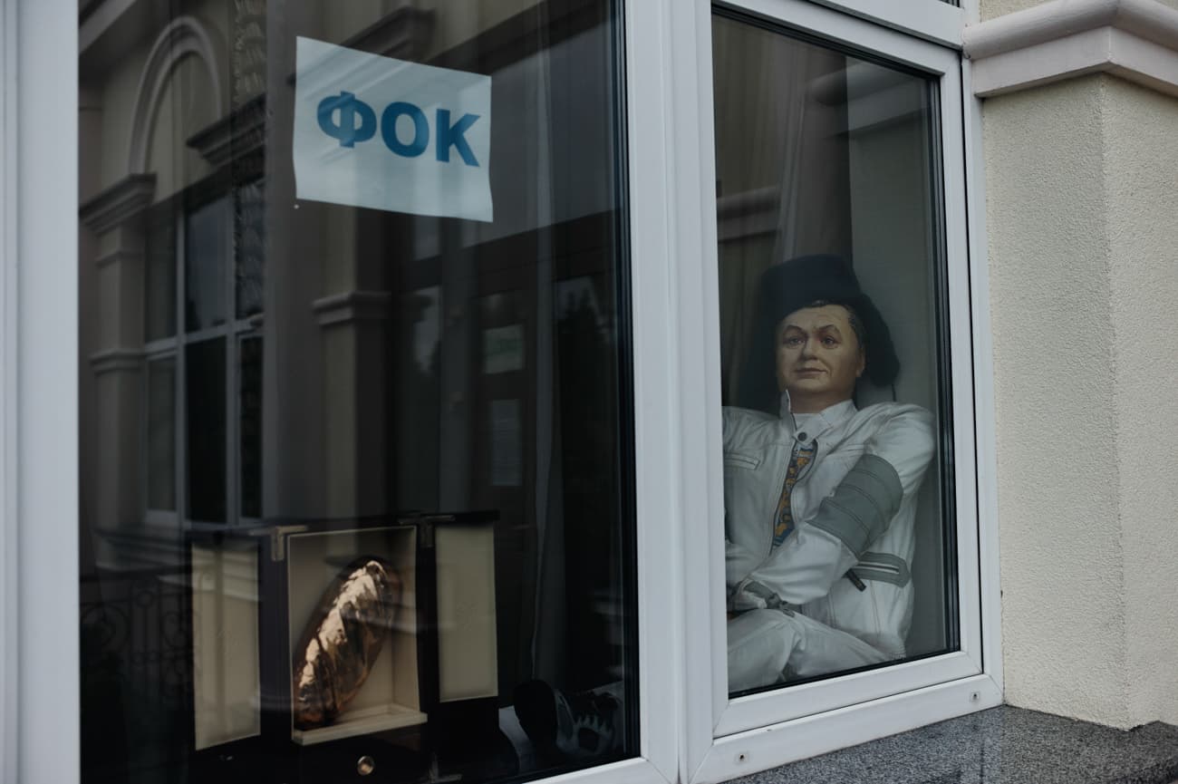A paper mache Yanukovich greets visitors outside the physical health complex.