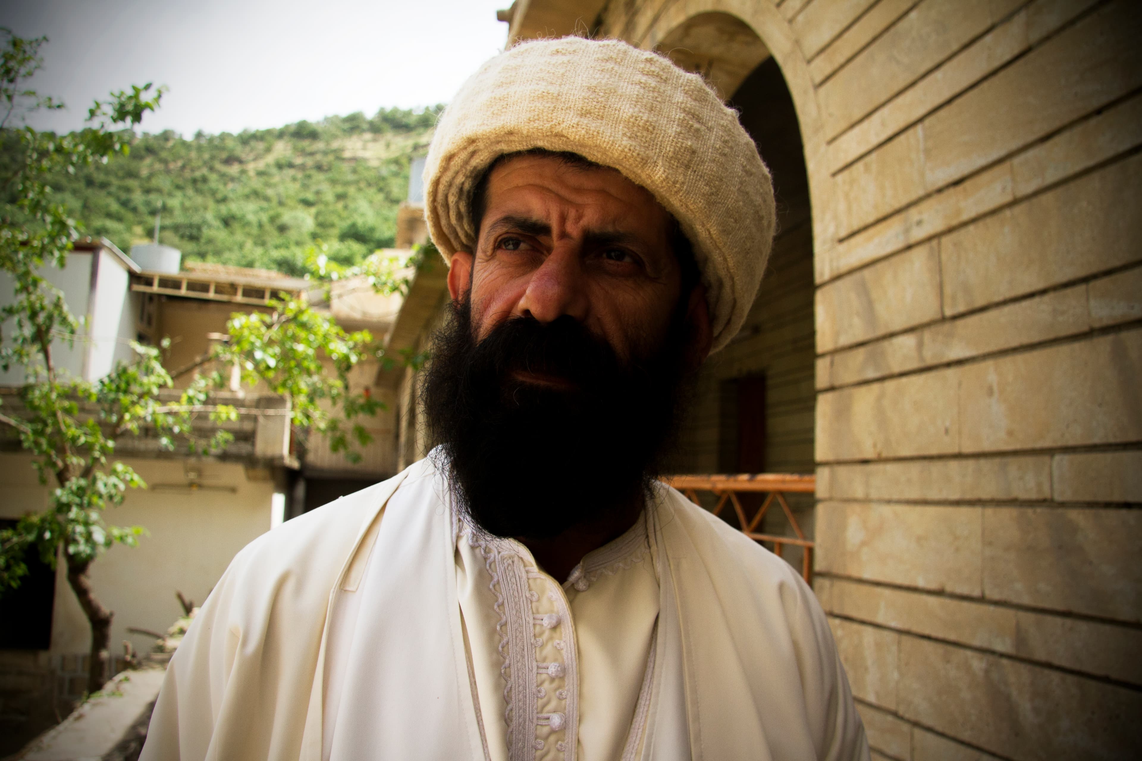 Baba Chawish, a Yezidi spiritual leader at Lalish temple, explains that before the Islamic State crisis, women who had been raped or forced to convert were traditionally cast out of Yezidi society. But now they can still be purified and baptized.