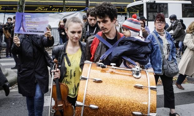 Musicians play a tribute in front of Bataclan, a concert hall and site of last week's terrorist attacks (Anadolu Agency/Getty)