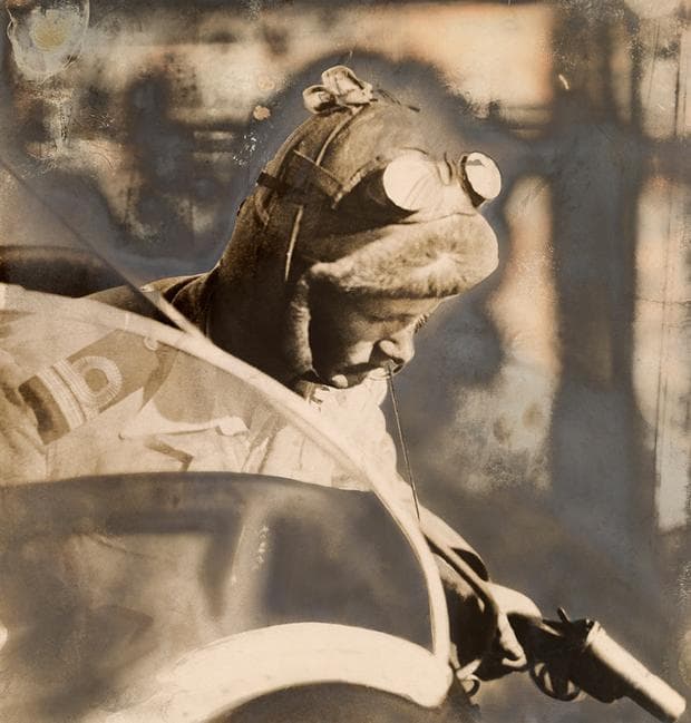 A British airman gives a signal to another friendly aircraft, 1918. (Photograph by Central News Photo Service, National Geographic Creative)