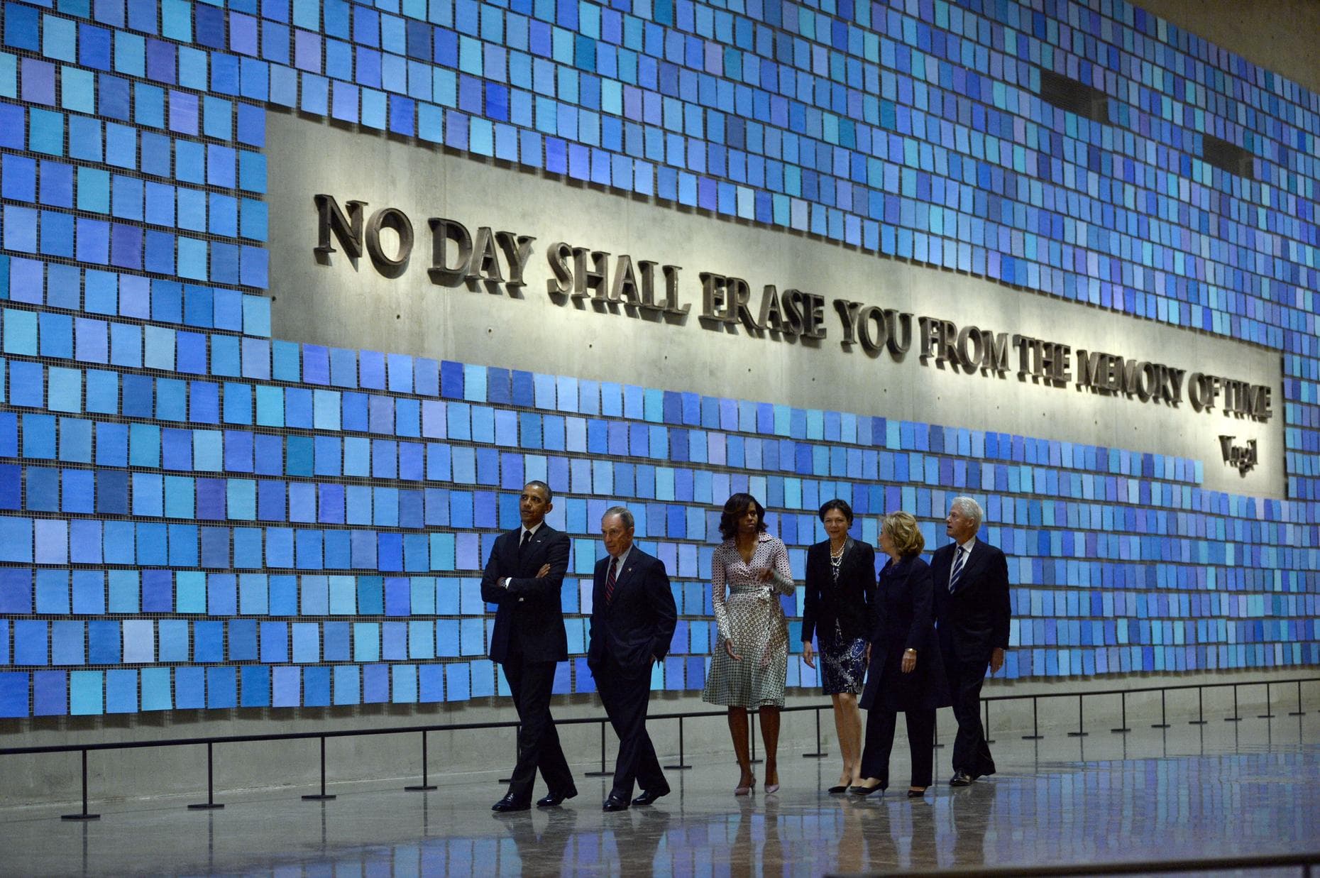 President Barack Obama, Michael Bloomberg, Michelle Obama, Hillary Clinton, and Bill Clinton tour the National September 11 Memorial & Museum. (Jewel Samad/AFP)