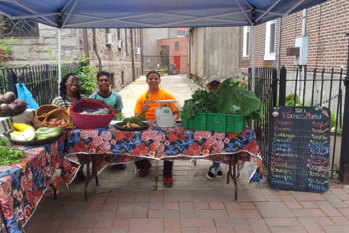 young entrepreneurs at a farmers' market