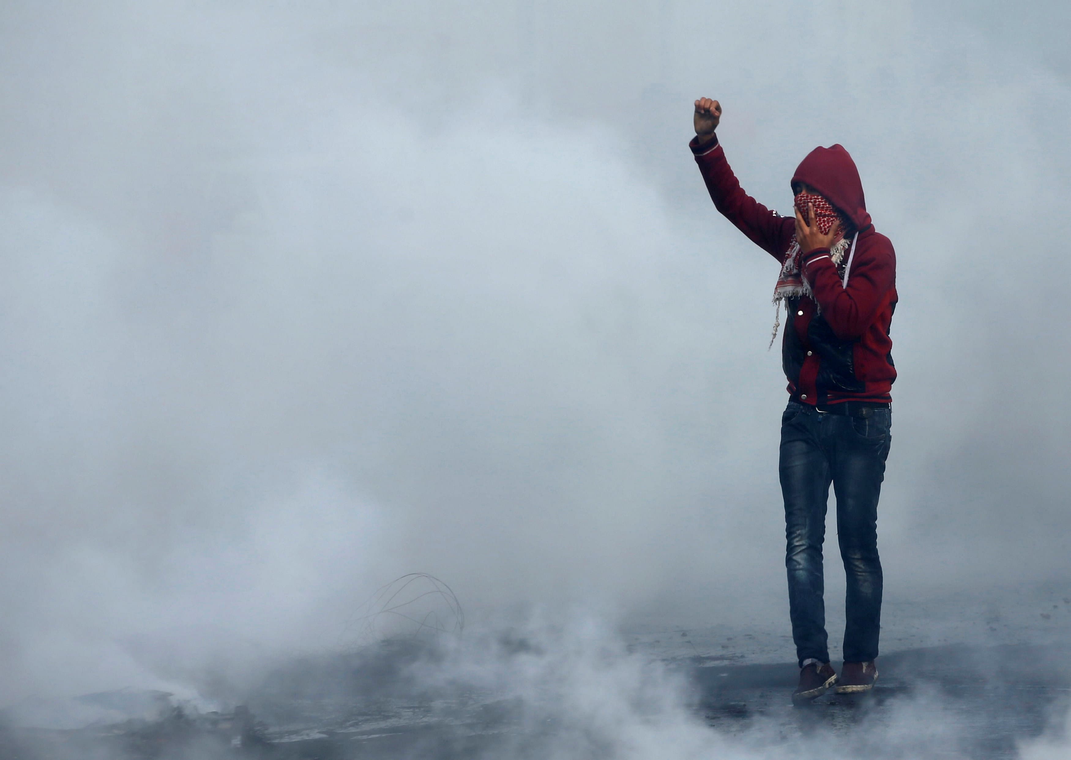 A Palestinian youth takes part in a protest over President Donald Trump's decision to recognize Jerusalem as the capital of Israel, in Gaza City Dec. 7, 2017.