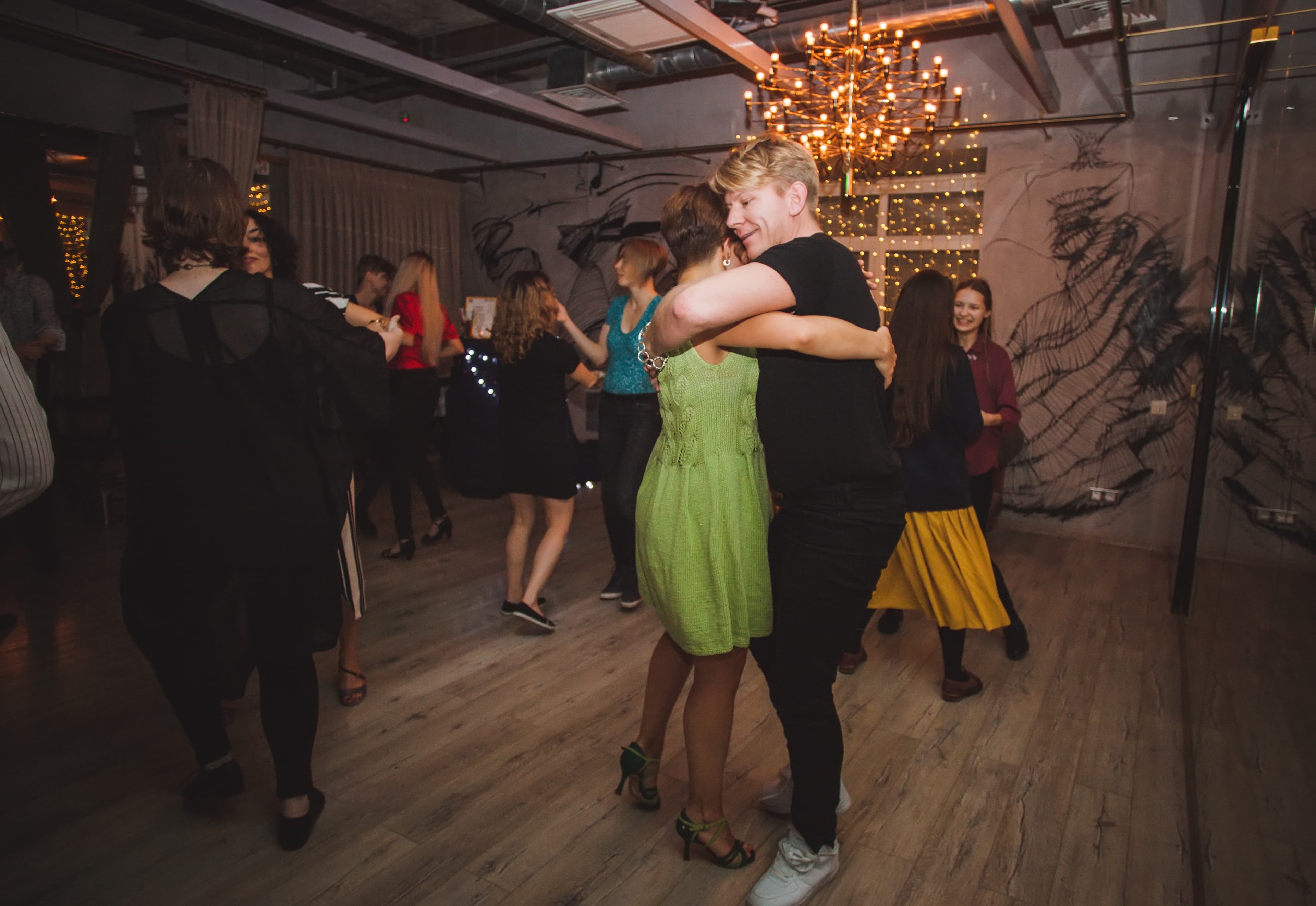 Couples dance together at a dance festival