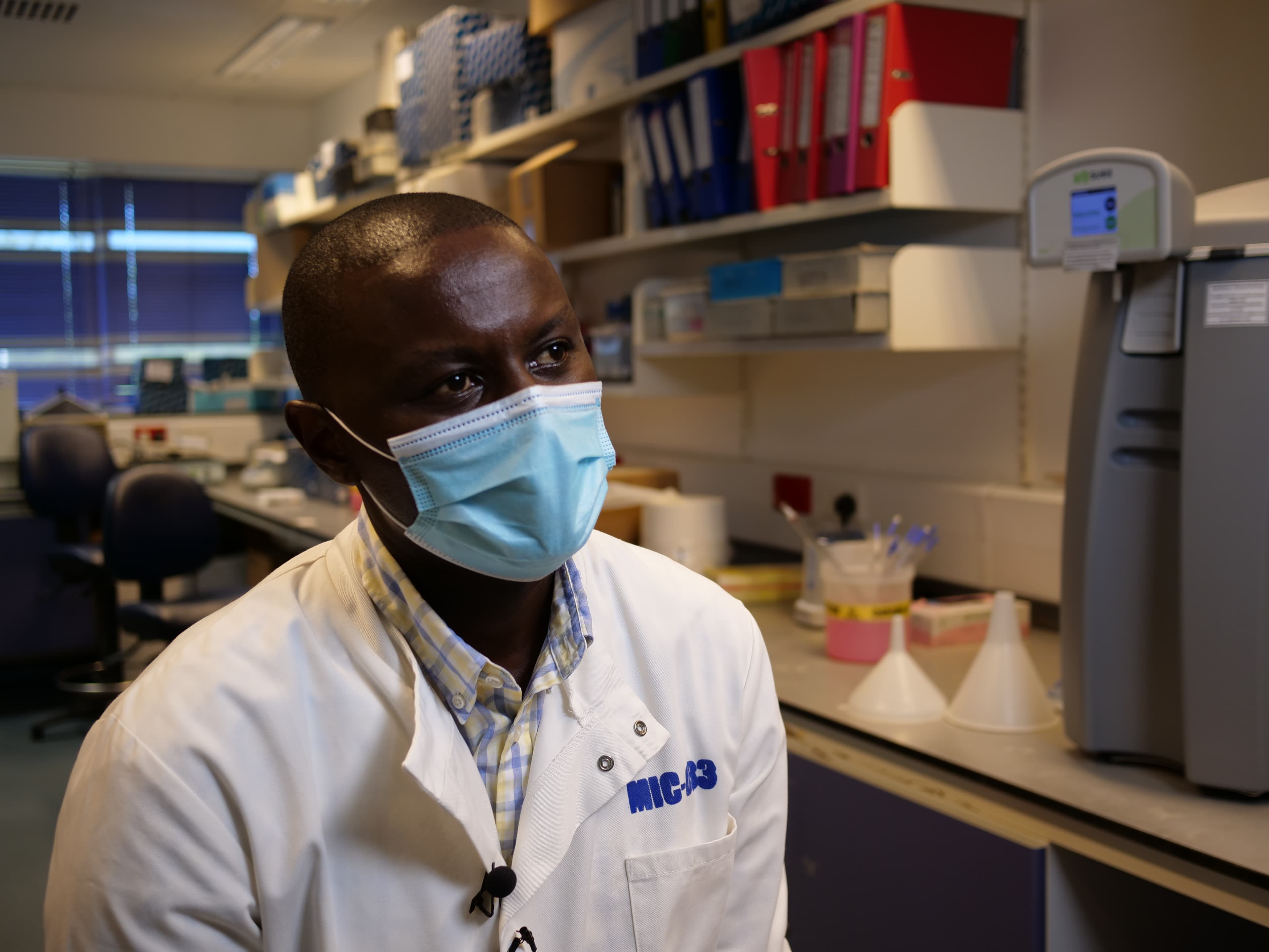 KEMRI’s principal investigator, George Warimwe, for the Oxford AstraZeneca COVID-19 vaccine trial is shown at the KEMRI Wellcome Trust lab in Kilifi, Kenya, on Nov. 13, 2020.