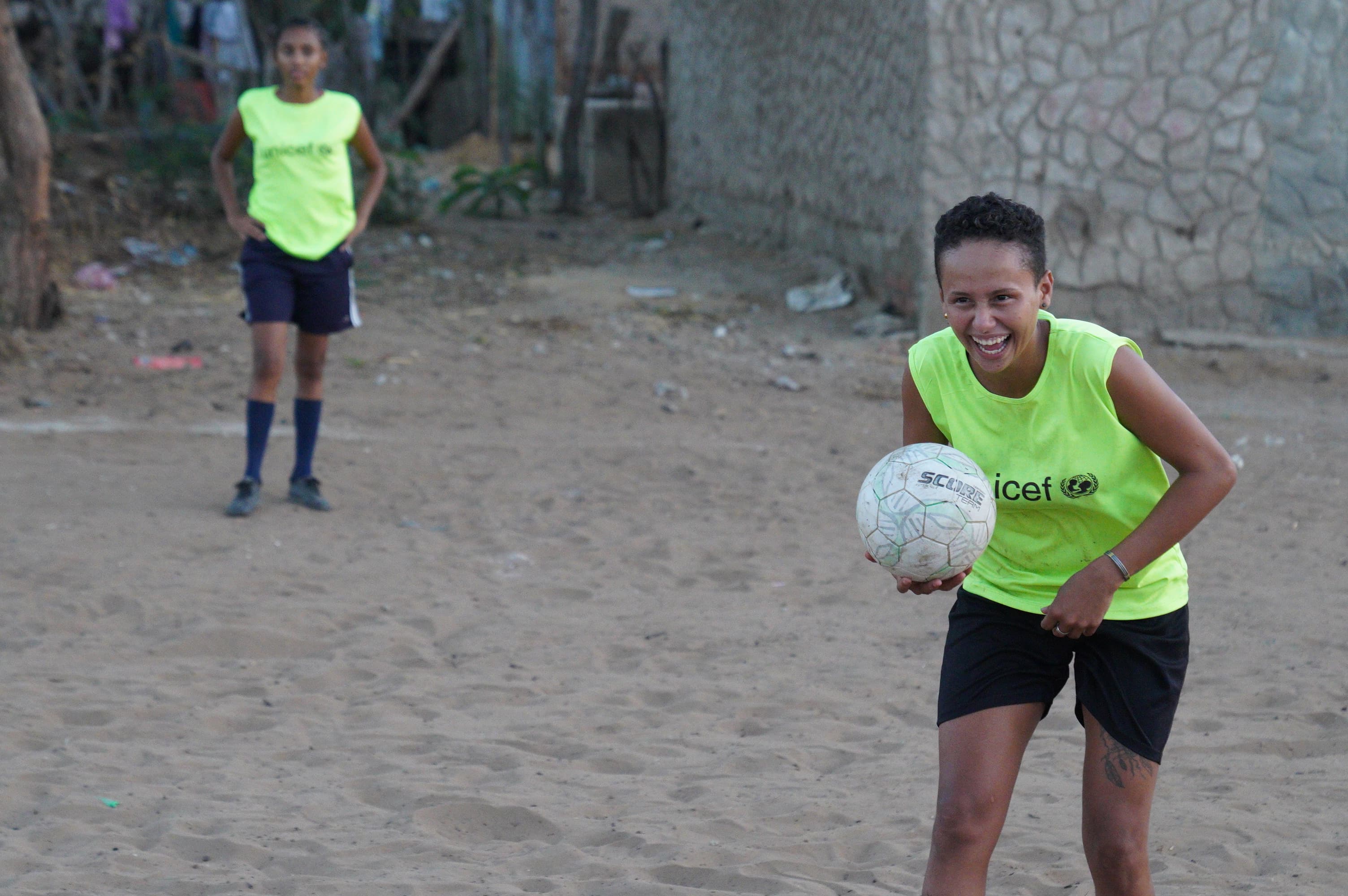 Maria Isabel Parra, 21, says that playing kick ball helps her to meet new people and deal with some of the stress that comes with being an unemployed migrant.