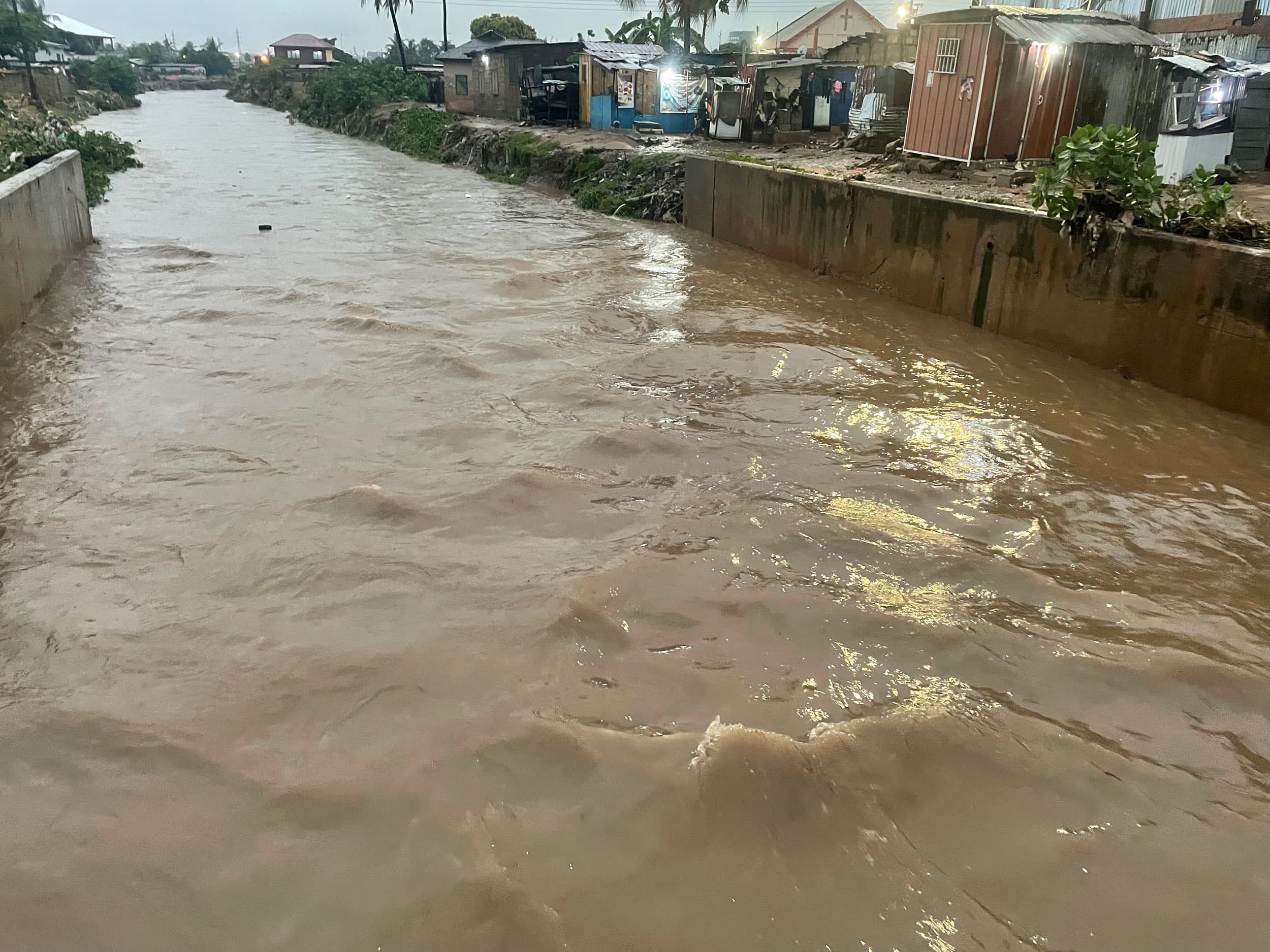 A major drain overflows during heavy rains and flooding.